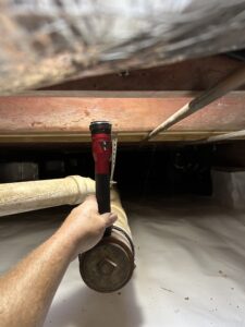 Charlotte plumber installing a cast iron sink and kitchen faucet