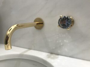 Charlotte plumber installing a cast iron sink and kitchen faucet