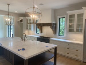 Charlotte plumber installing kitchen plumbing for stove backsplash and island sink