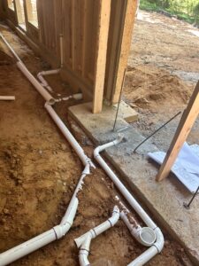 Underground plumbing and sewer rough-in work for custom home builder in charlotte nc